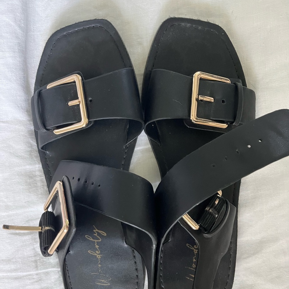 Wonderly Black Slide Sandals with Gold Buckles - Women